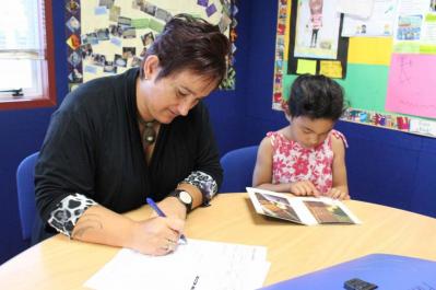 Teacher with student.